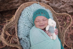 shooting photo bébé avec doudou